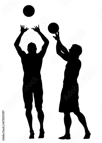 Young athletes playing volleyball on beach