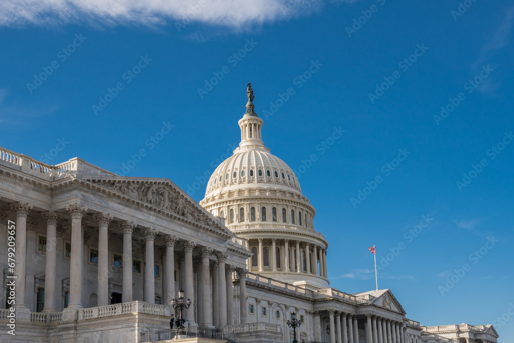 Obraz premium Washington, DC, United States Capitol Dome with bright blue sky in background.