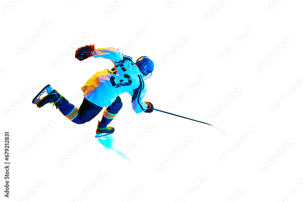 Fototapeta premium Top view image of young girl, hockey player in motion during game, training, playing against white background in neon light. Concept of professional sport, competition, game, action, hobby