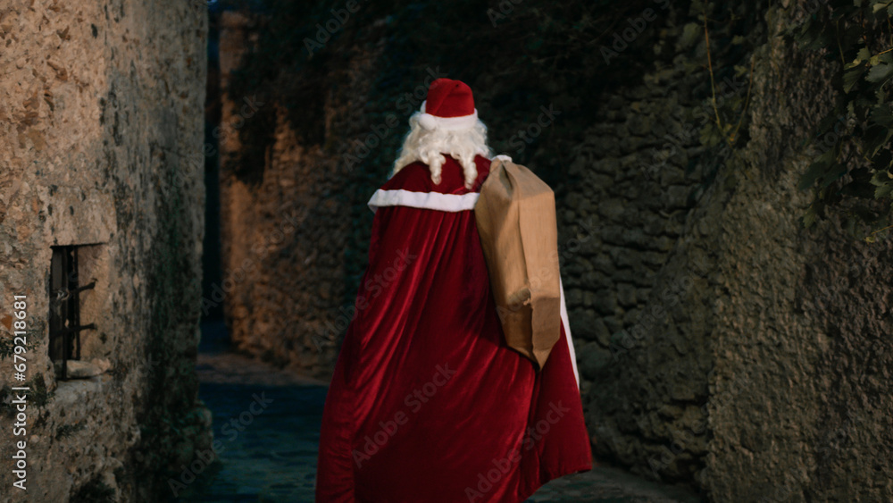 Santa Working outside with a bag full of presents Santa Working outside with a bag full of presents