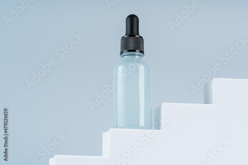 Hero top view of face serum or gel on a white podium, product presentation, marketing strategy