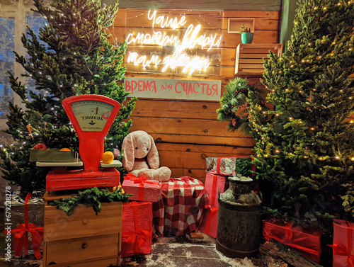 The veranda on the street is decorated for Christmas. Outdoor decor with Christmas tree and decorations.