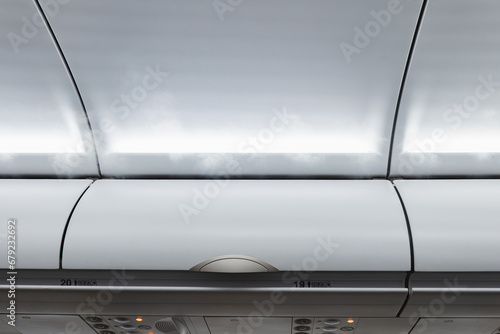 Принти на полотні airplane luggage compartment