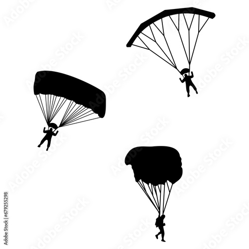 paraglider silhouette on sky