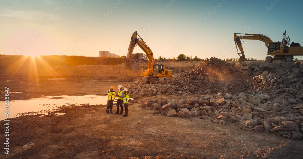 Aerial Drone Shot Of Construction Site With Excavators On Sunny Day: Diverse Team of Real Estate Developers Discussing Project. Civil Engineer, Architect, Inspector Talking And Using Tablet Computer. - obrazy, fototapety, plakaty 