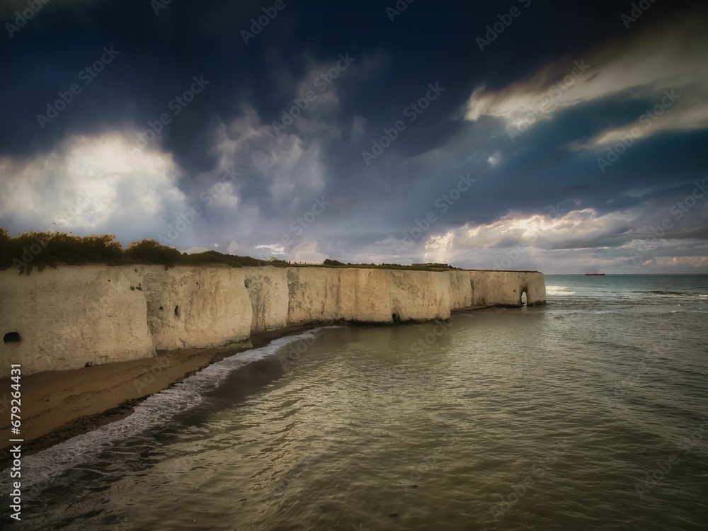 Scenic view of Kingsgate Bay on a gloomy cloudy day. Kent, England