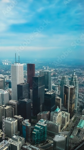 the city skyline of chicago, illinois from a skyscraper overlooking the sky