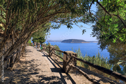 View of Procida coast from a evocative pathway on Ischia Island, Italy.