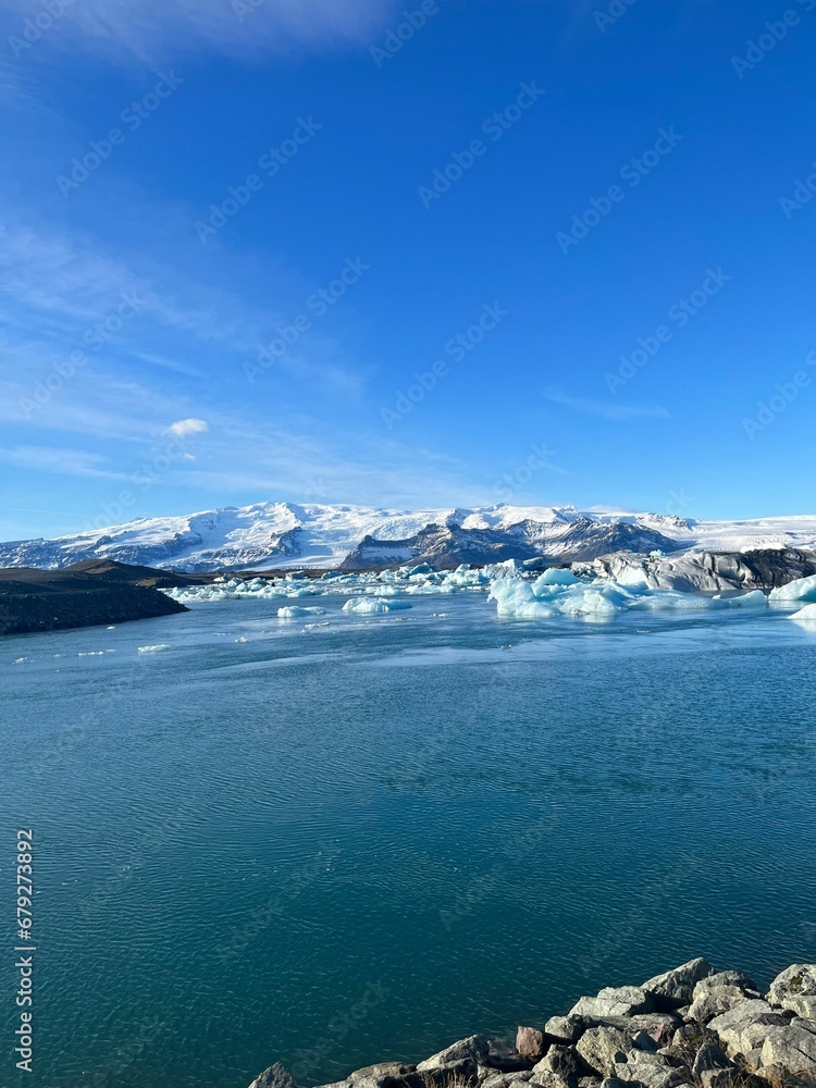 Scenic view of melting ice in the sea on a sunny day