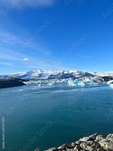 Scenic view of melting ice in the sea on a sunny day