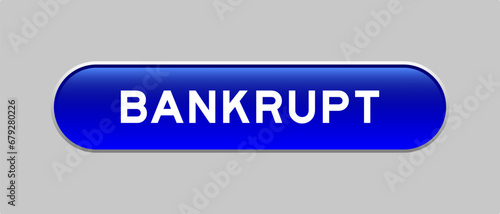 Blue color capsule shape button with word bankrupt on gray background