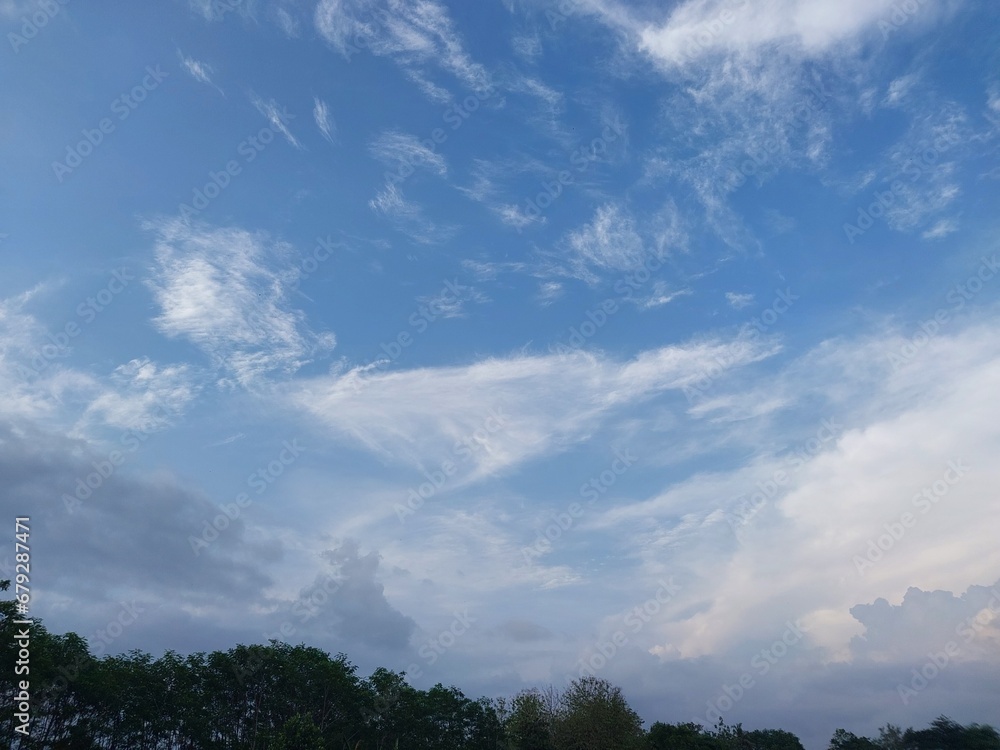 white clouds on a blue sky background. summer cloud tecture white clouds on a blue sky background. summer cloud tecture