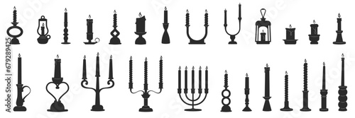 Retro candles in candlesticks set. Candle holders