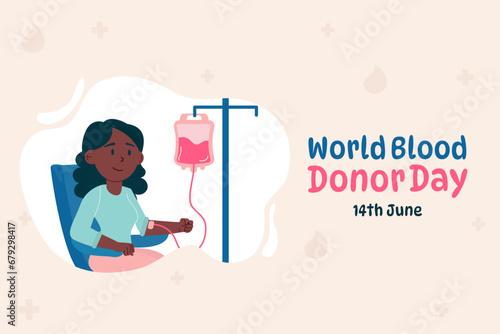 World blood donor day background. An African American woman donates blood