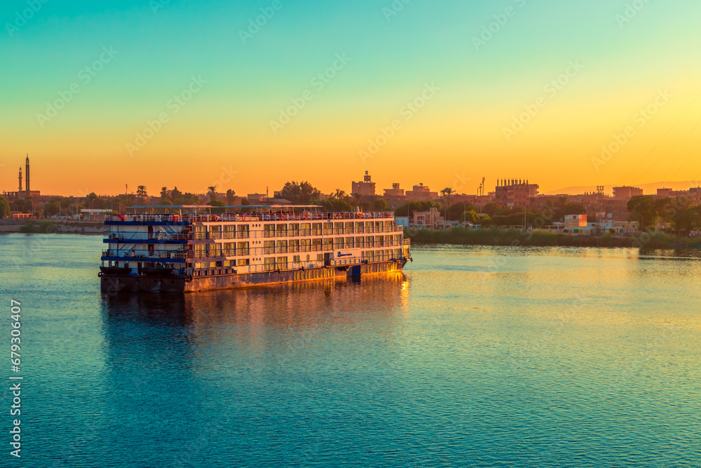 Cruise ships awaiting locking. Sunset on the Nile.
