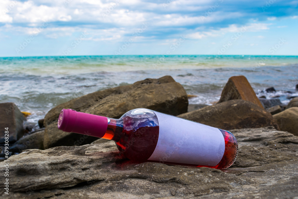 Bottle of wine by the sea Bottle of wine by the sea