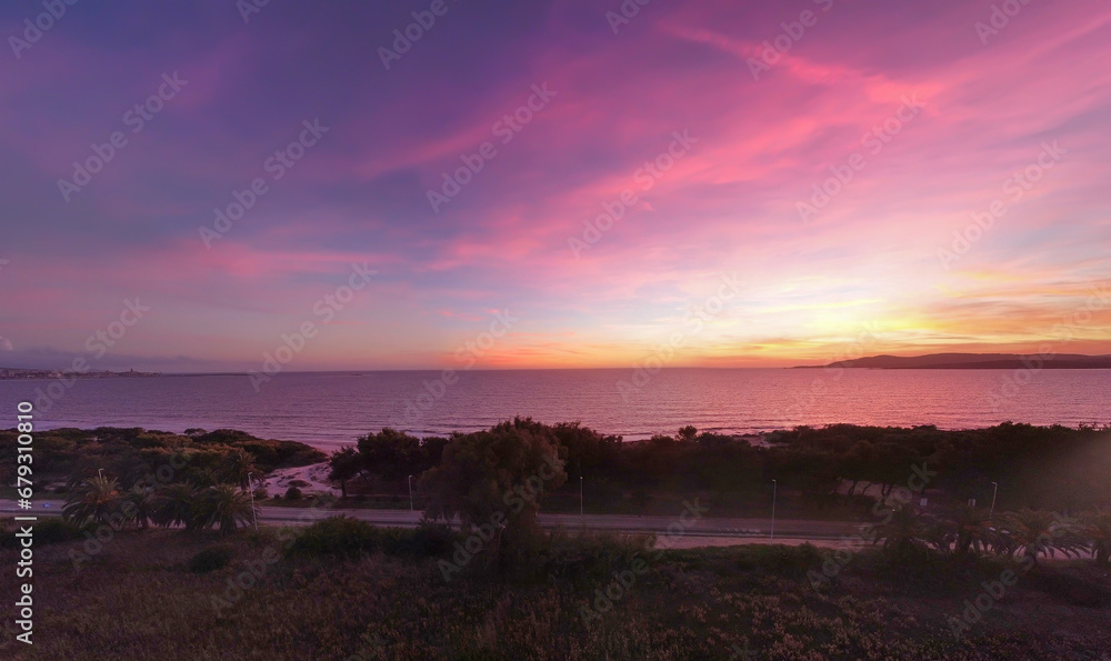 Pink sunset in Maria Pia beach