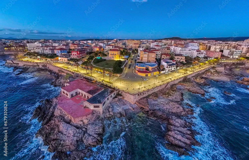 Aerial view of Alghero rocky shore at night