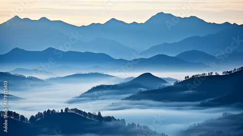 A view of a mountain range covered in fog