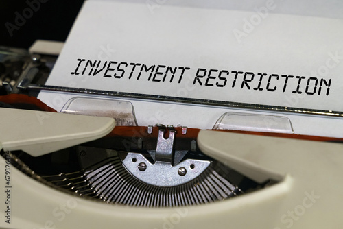 The text is printed on a typewriter - investment restriction