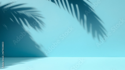 3D rendering of empty blue room with shadow of palm leaf.
