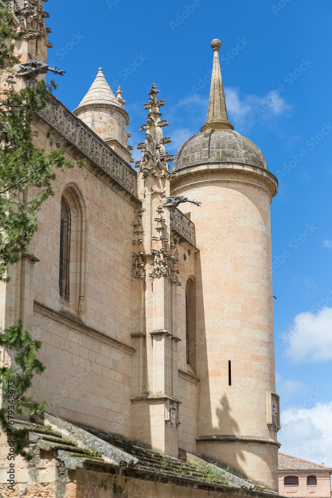 Detailed front view at the iconic spanish gothic ornaments building at the Segovia cathedral, towers and domes