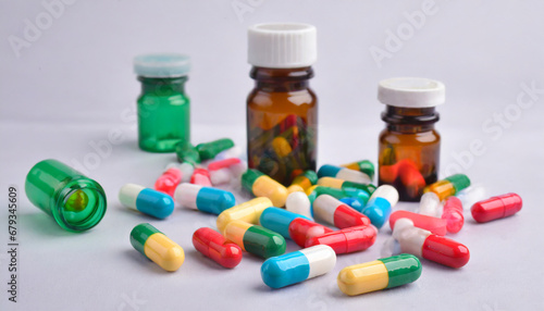 set of scattered capsules on a white background capsule bottles isolated on background capsule pharmacy bottle pill drug concept
