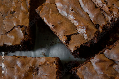 Detail of some delicious dark chocolate brownies straight out of the oven.