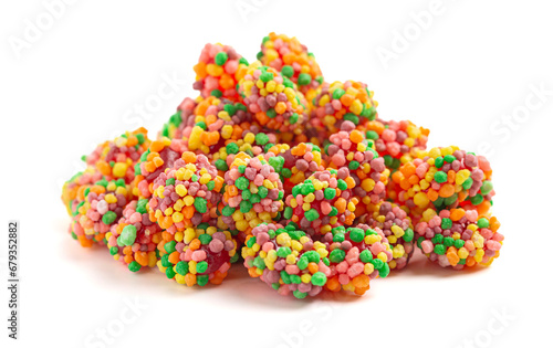 Sweet and Tangy Candy with Small Candies on the Outside of a Chewy Center Isolated on a White Background