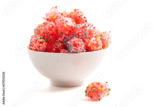 Freeze Dried Sweet and Tangy Candy with Small Candies on the Outside of a Chewy Center  Isolated on a White Background photo