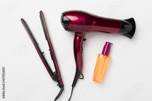 Hair tools with thermo protection on color background, top, view