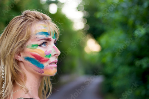 Cute woman with painted face