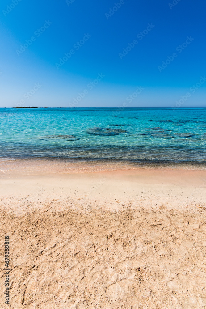Beautiful view of Elafonisi Beach, Chania. The amazing pink beach of Crete. Elafonisi island is like paradise on earth with wonderful beach with pink coral and turquoise waters.