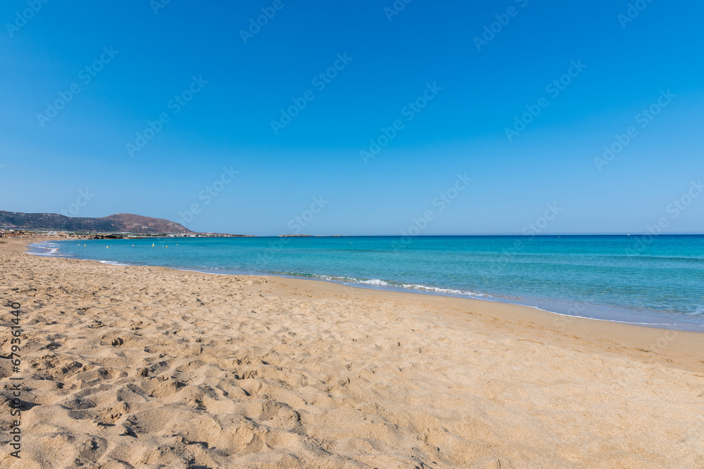 View of the sea in the Island with sandy beach, cloudless and clear water. Tropical colours, peace and tranquillity. Turquoise sea. Falasarna beach, Crete island, Greece.