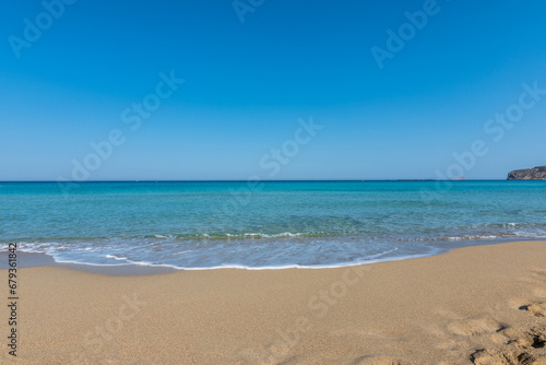 View of the sea in the Island with sandy beach  cloudless and clear water. Tropical colours  peace and tranquillity. Turquoise sea. Falasarna beach  Crete island  Greece.