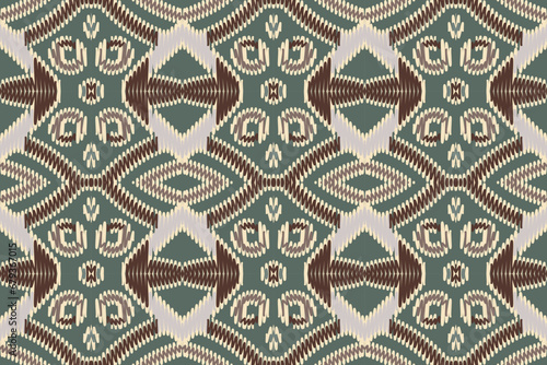 African Ikat paisley seamless pattern.geometric ethnic oriental pattern traditional on green background.Aztec style abstract vector illustration.design texture,fabric,clothing,wrapping,carpet,print
