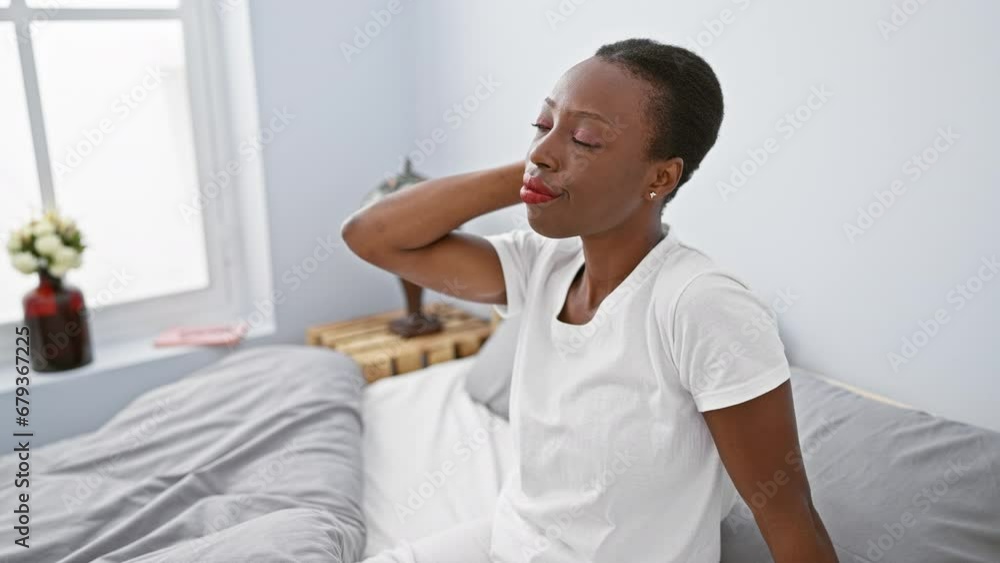 Uncertain african american woman pensively thinking in bed, wrestling with doubtful questions, creating a pensive atmosphere in the bedroom Uncertain african american woman pensively thinking in bed, wrestling with doubtful questions, creating a pensive atmosphere in the bedroom