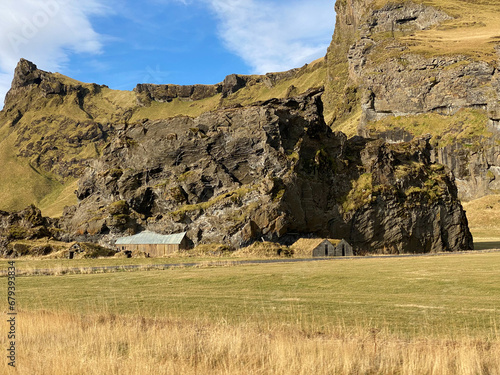 Drangurinn in Drangshlíð by Eyjafjöll mountains in southern Iceland near Ring Road, Route 1. Turfhouses linked to elves, folklore, sagas, and legends.  photo