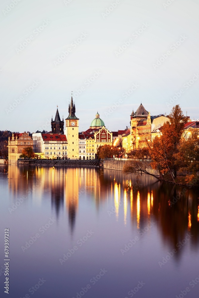 Beautiful medieval buildings of Prague illuminated in the waters