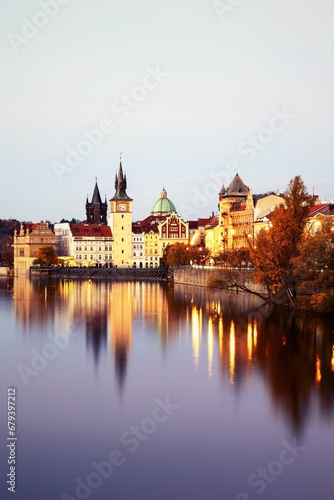 Beautiful medieval buildings of Prague illuminated in the waters