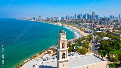 Aerial view of the old city tower in Israel, overlooking the horizon of the city of Tel Aviv photo