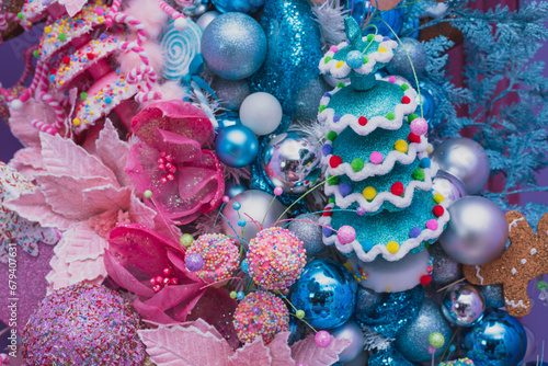 This stunning Christmas tree, adorned in shades of blue and pink, is a mesmerizing sight. It sparkles with festive charm, creating a magical holiday atmosphere. © Alfredo Juarez