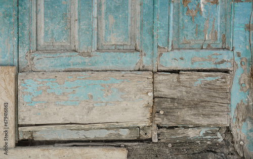 Rustic painted wood boards with dry peeling grunge paint 