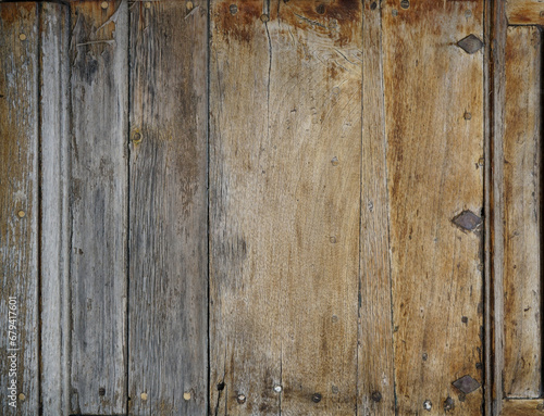 Distressed wood background floor wall boards with reclaimed vintage texture and aged finish 
