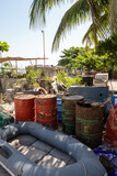 des bidons d'hydrocarbure dans un port de pêche traditionnel de la ville de Dakar au Sénégal en Afrique occidentale
