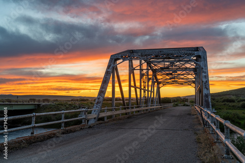 A Camelback Parker Through Truss Bridge, Warren Bridge through view along the old highway roadbed, now Highway 191, Daniel, Wyoming