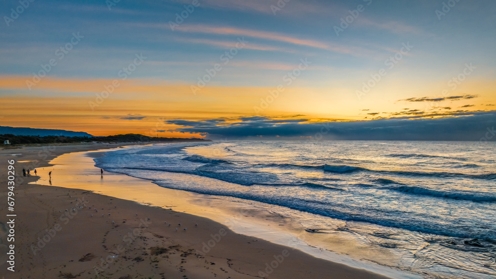 Sunrise seascape with waves