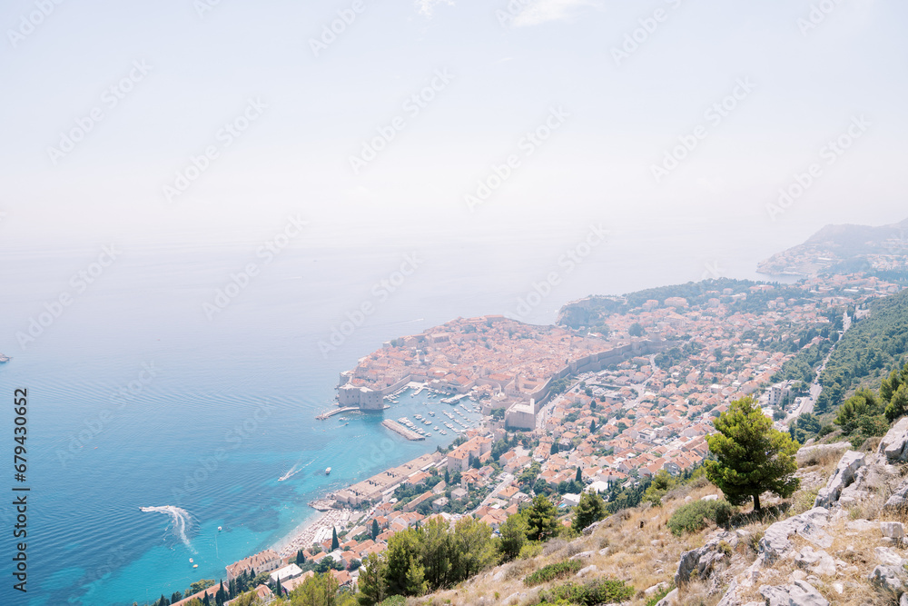 View from the mountain of the ancient houses of Dubrovnik on the seashore. Croatia