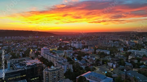 Aerial drone view of Iasi at sunset, Romania. Multiple historical and residential buildings, greenery photo