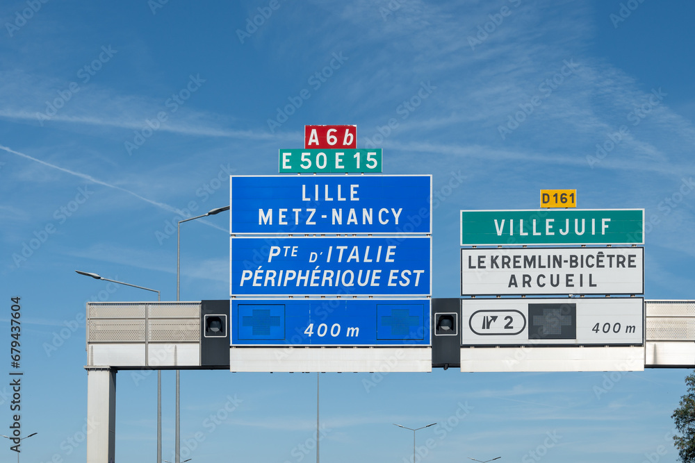 Highway road signs Paris, driving in heavy traffic on ring road of capital of France, traffic jam problems in Paris